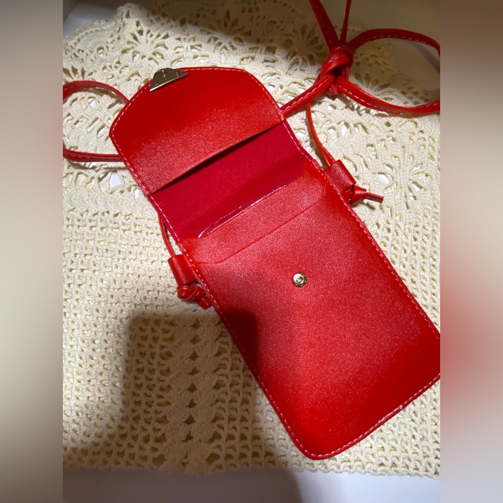 3/$15 Red faux leather crossbody with heart snap and clear back - Picture 3 of 10